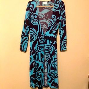 213 turquoise and brown wrap around dress w/ low neck. Size approx size 10.